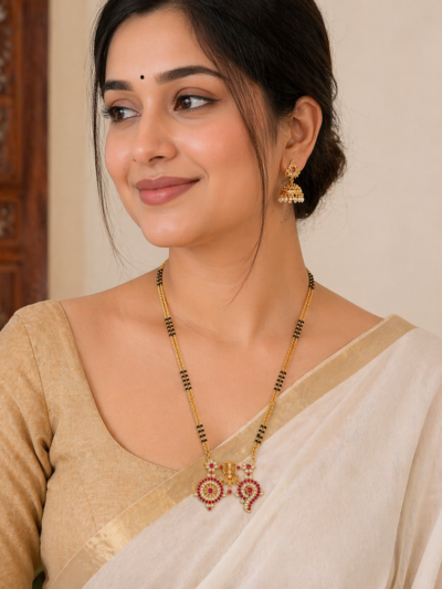 Shop by Category 31 Lakshmi Devi Black Beads Necklace with Goddess Lakshmi pendant and sparkling stone detailing